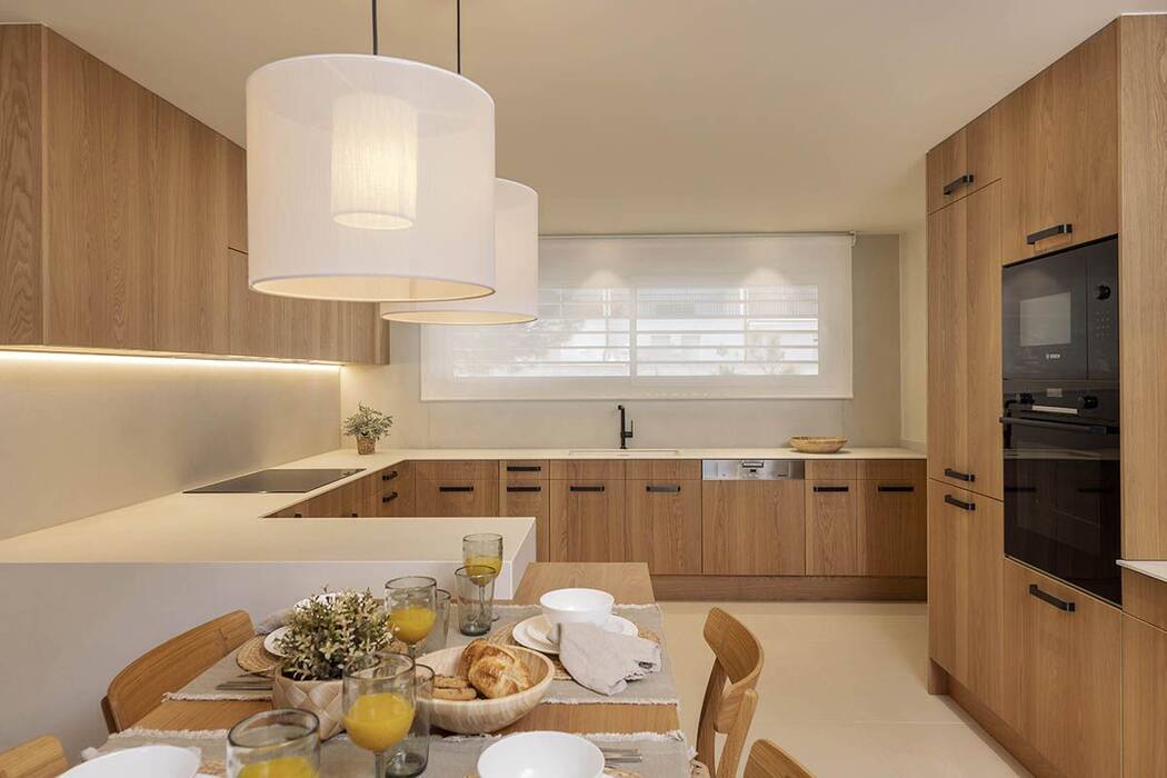 Isla de cocina con mesa de comedor: características y opciones de diseño