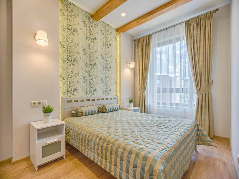 La elección de cortinas para un dormitorio beige